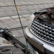 MOSCOW - MAR 19: Infiniti fx35 jumpstart other car to start the